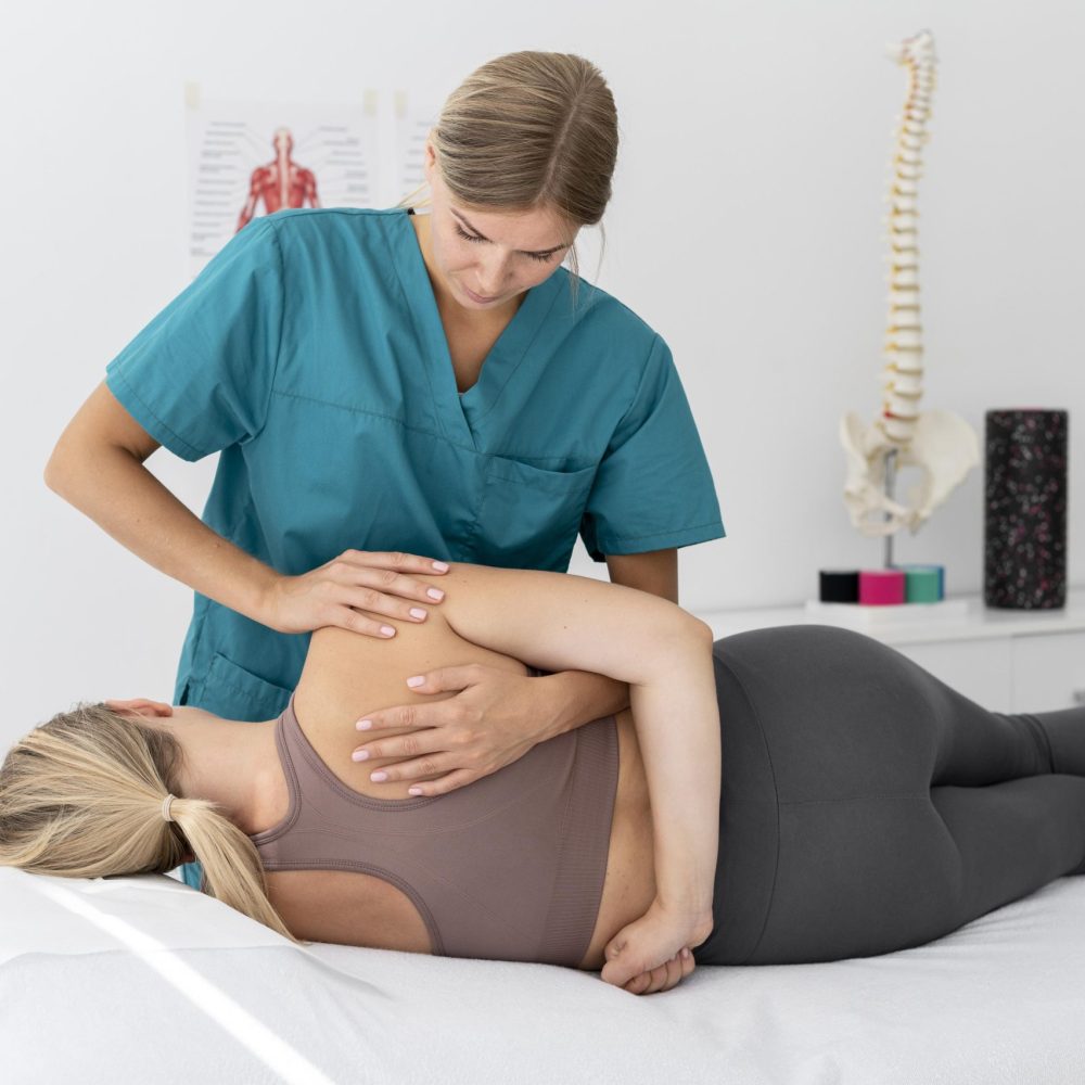 physiotherapist-helping-patient-her-clinic